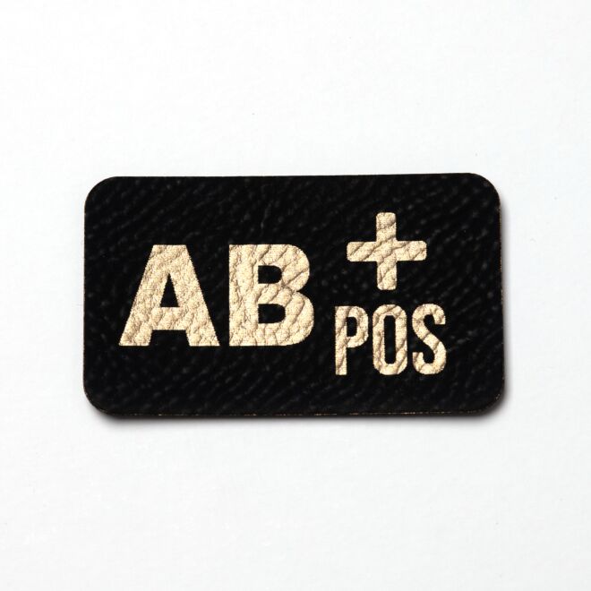 Imitation leather label "Blood group AB+" (black/gold)